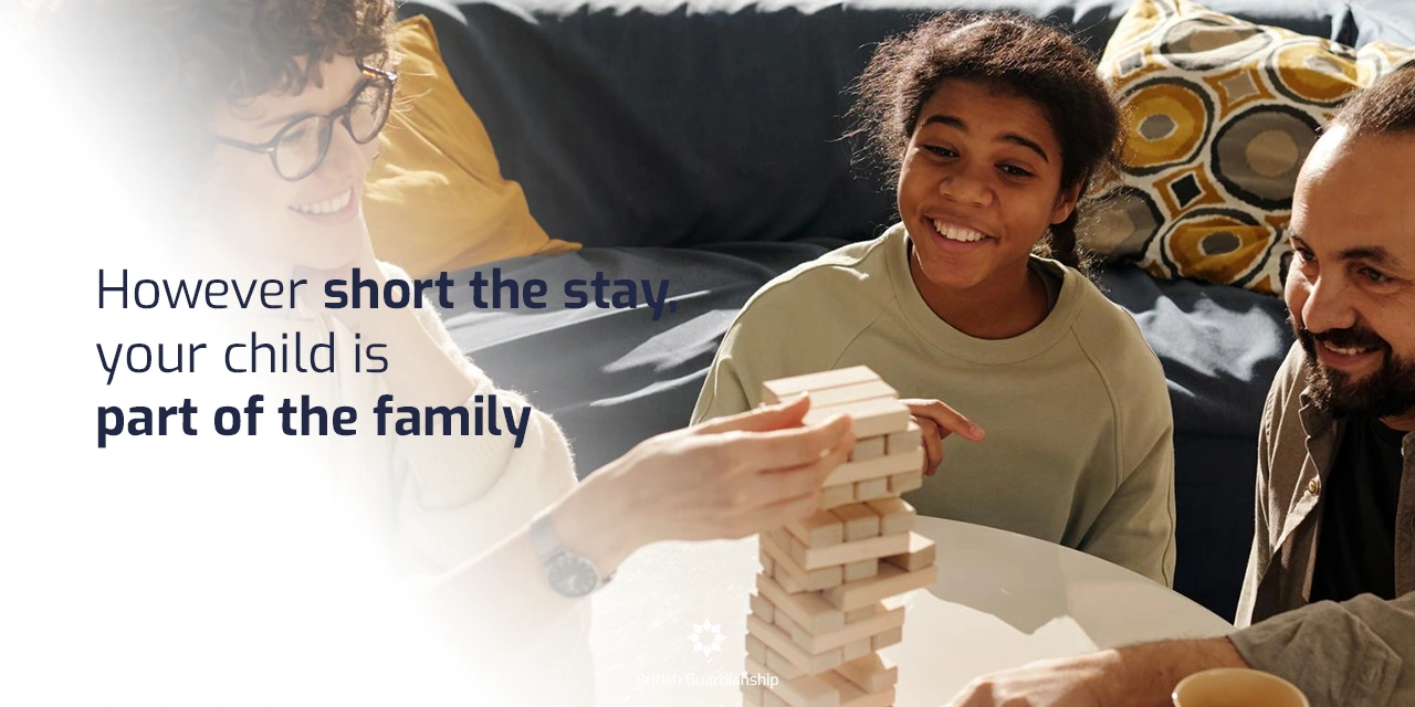 Host family spending time with a student playing game